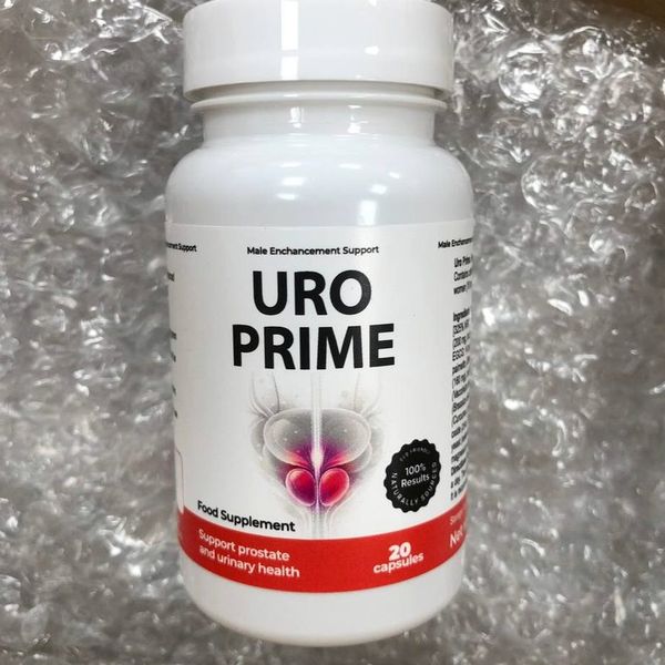 Biela dóza UroPrime s vrúbkovaným viečkom leží na priehľadnej bublinkovej fólii, odfotená spredu